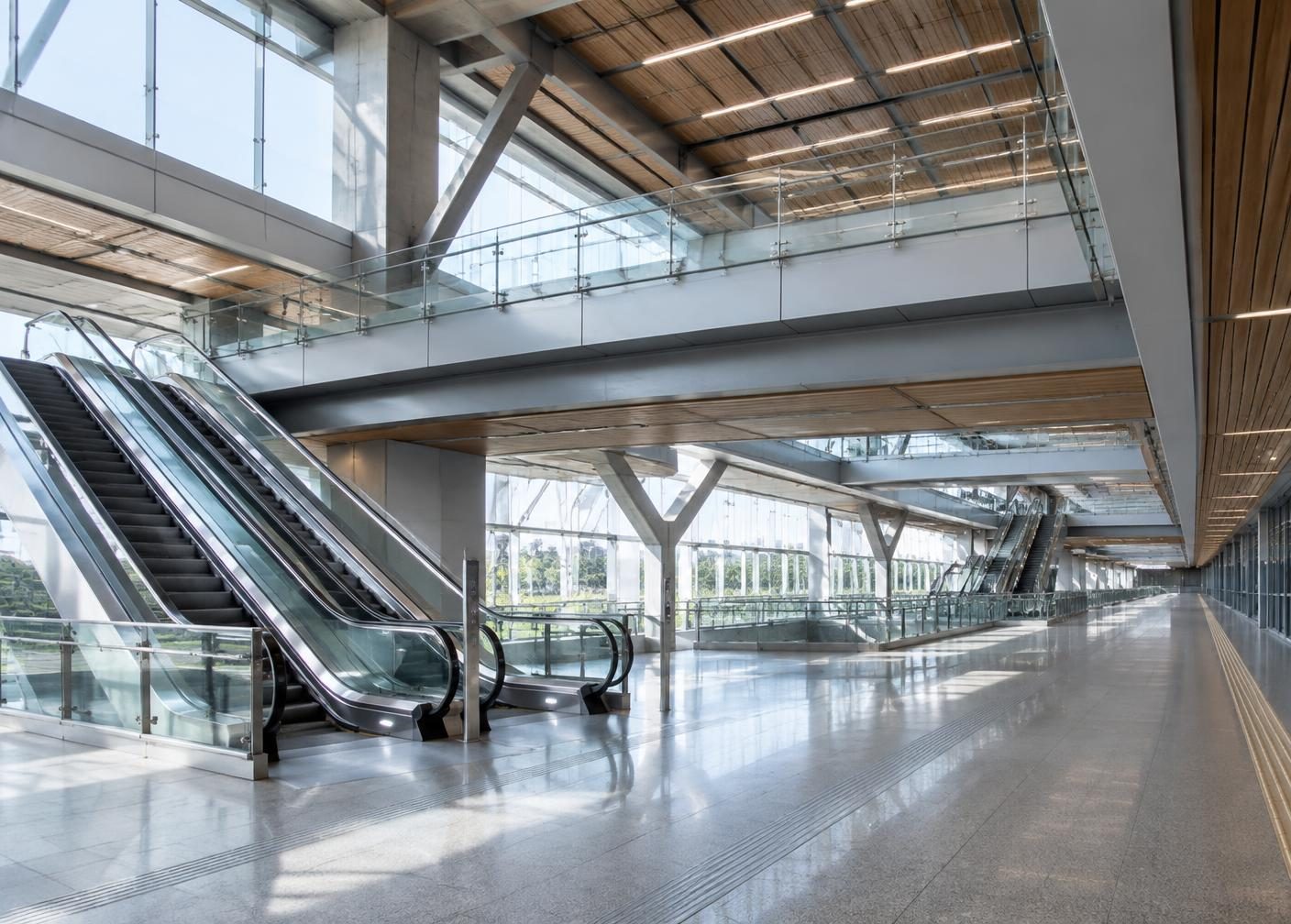 Renovated transit concourse with coordinated walkways and escalators